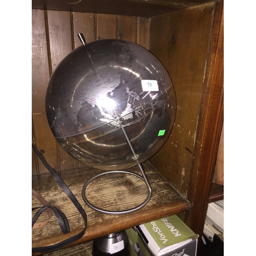 70 - A plastic see through globe on chromed stand.