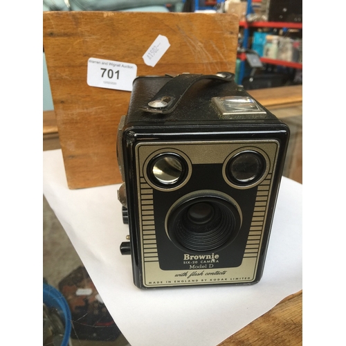 701 - A Brownie Six-20 Model D camera in wooden case