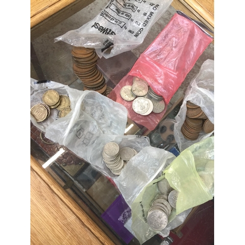 718 - A bag containing six bags of mainly pre decimal coins