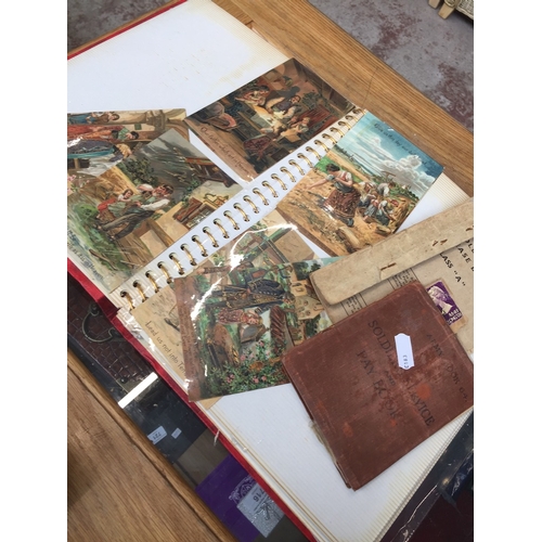 722 - A photo album containing vintage postcards, embroidered cards etc