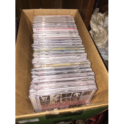 75 - Box of CDs