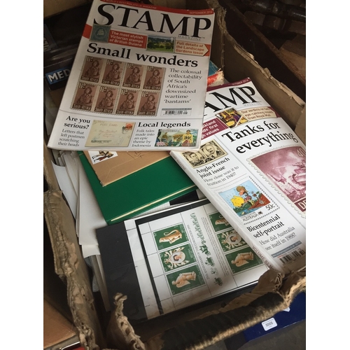 1142 - Box of stamp albums, pages and books