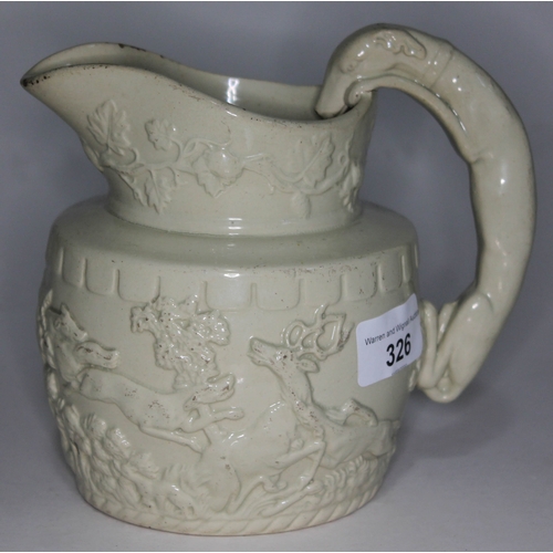 326 - A 19th century white salt glazed jug decorated all over with hunting scene, height 16cm.