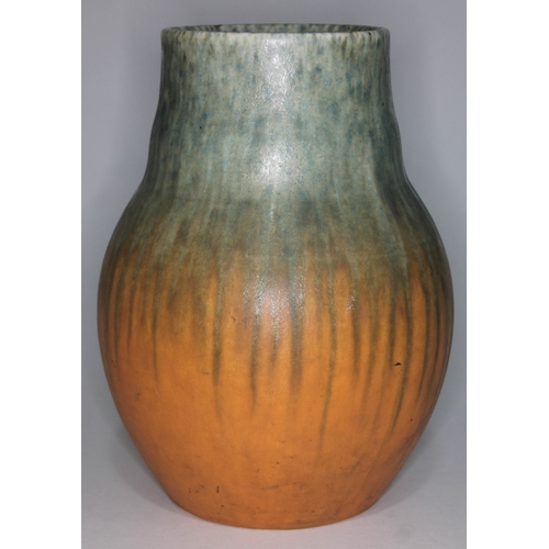 327 - A Ruskin pottery vase with green and orange mottled and crystalline glaze, with impressed mark, date... 