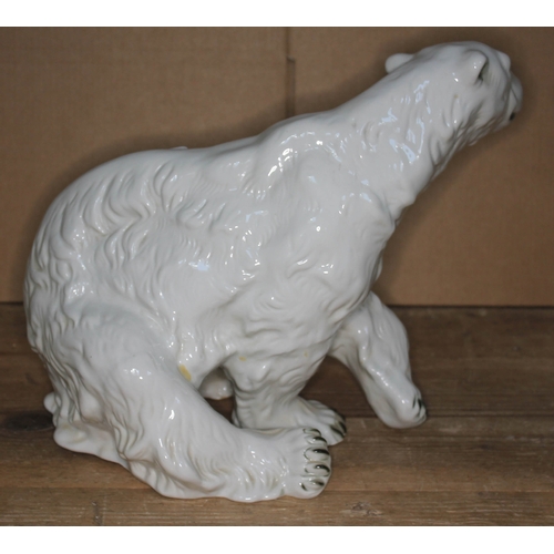 328 - A Royal Dux Polar Bear pottery figure, height 26cm, length 33cm.