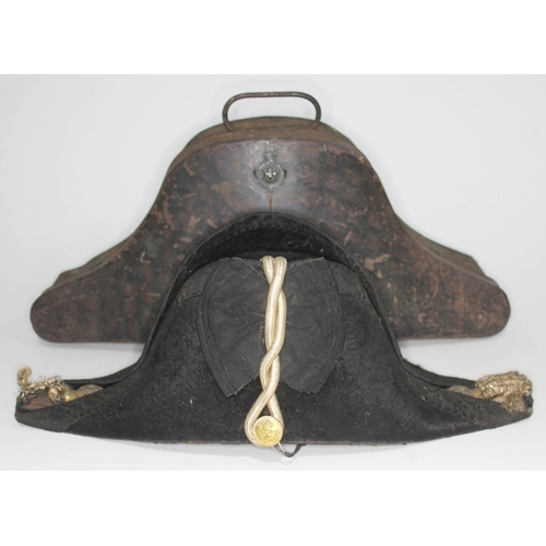 342 - A 19th century British Royal naval officer's bi-corn hat by J. Cleve & Sons with gold wire decoratio... 