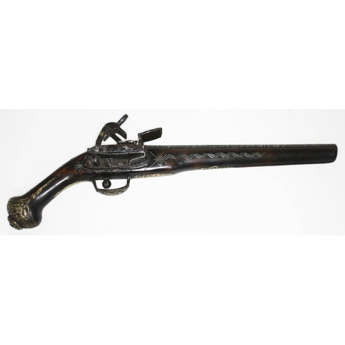 343 - A 19th century Eastern pistol with Miquelet lock, length 48cm.