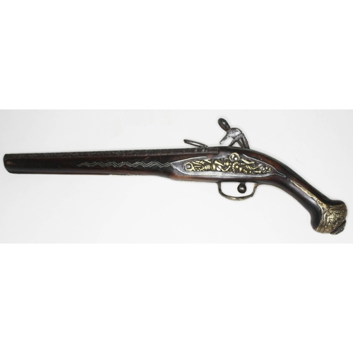 343 - A 19th century Eastern pistol with Miquelet lock, length 48cm.