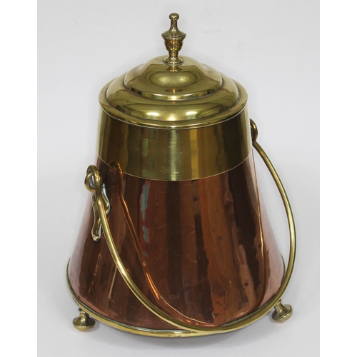 377 - A 19th century copper and brass coal hod.