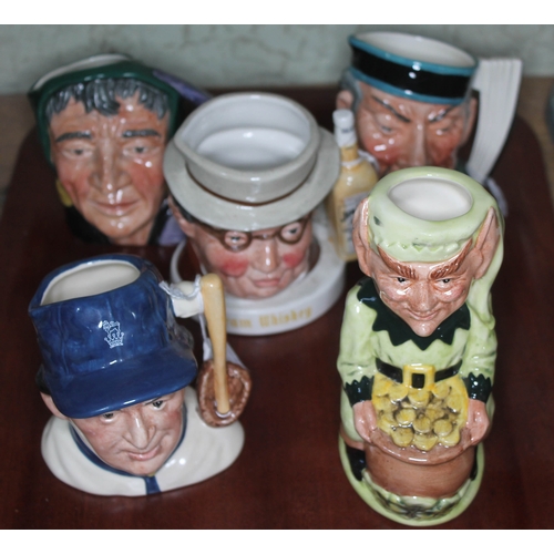 426 - A collection of five Royal Doulton character jugs comprising The Baseball Player D6878, Mr Pickwick,... 