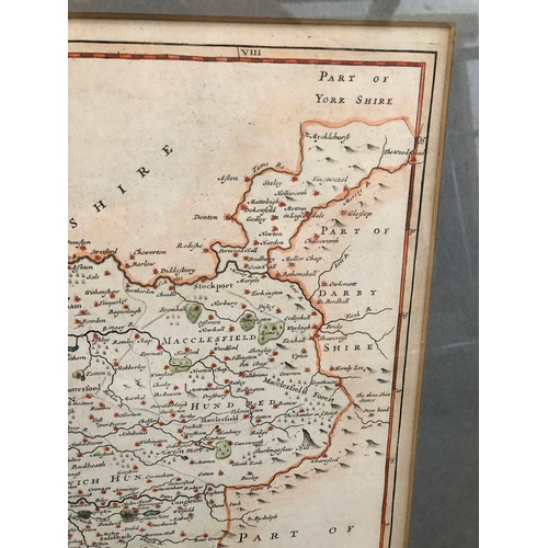 447 - An engraved map depicting Flintshire by Robert Morden 41cm x 34cm.