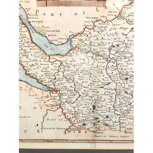 447 - An engraved map depicting Flintshire by Robert Morden 41cm x 34cm.