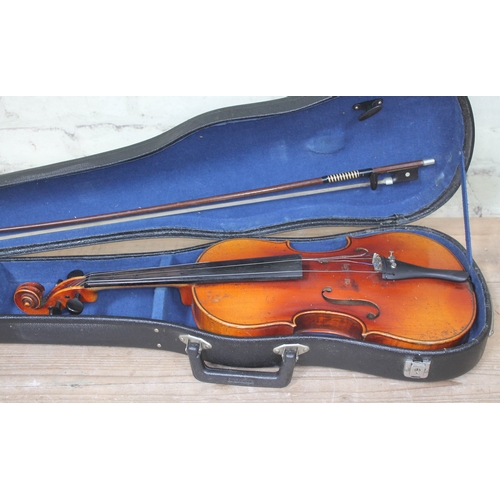 299 - An early 20th century student violin, length of back 37.5cm, with hard case and bow.