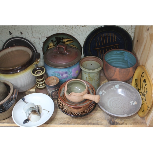 199 - A shelf of approx. 40 pieces of mainly studio pottery, various potters and studios.