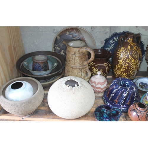 203 - A shelf of mainly studio pottery, various potters and studios, approx. 50 pieces.