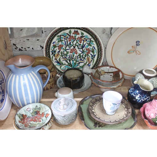 204 - A shelf of mainly studio pottery, various potters and studios, approx. 44 pieces.