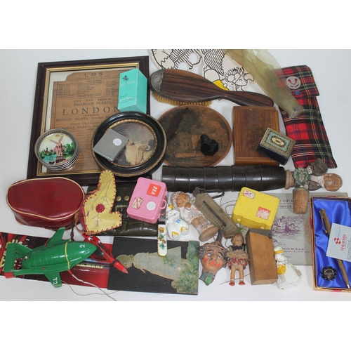 241 - A box of misc. items including a framed excursion ticket, toys, bottle stops, a silver mounted woode... 