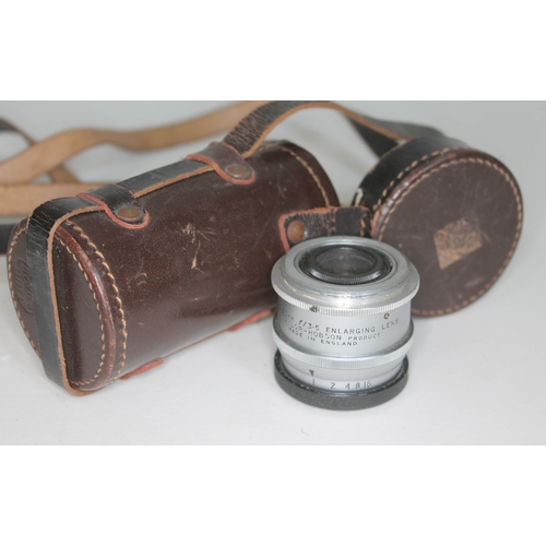 247 - A Taylor Hobson enlarger lens with associated leather case.