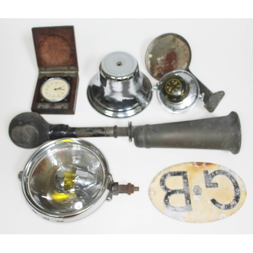 253 - A quantity of automobilia comprising a Lucas no. 60 brass car bulkhead bulb horn, a Smiths car clock... 