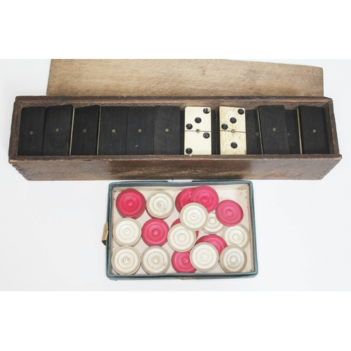 259 - A set of Victorian carved ivory draughts pieces and a set of bone and ebony double nine dominoes in ... 