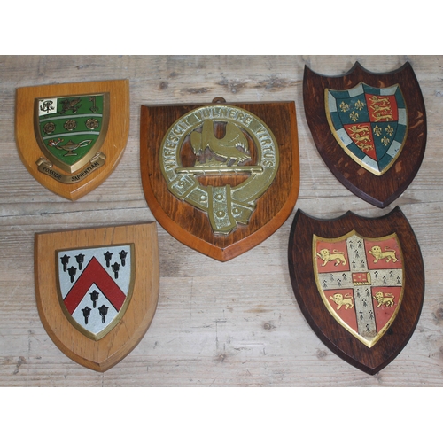 283 - A group of five heraldic shields.