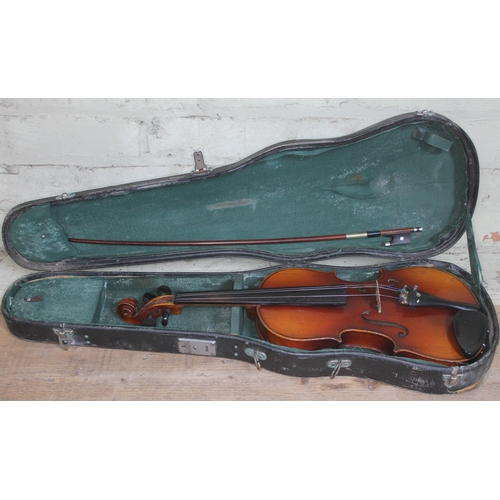 295 - A student violin with bow and hard case.