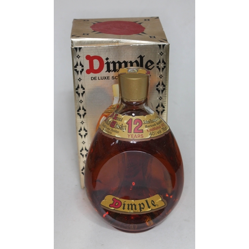 An unopened bottle of John Haig & Co Dimple deluxe Scotch 12 year