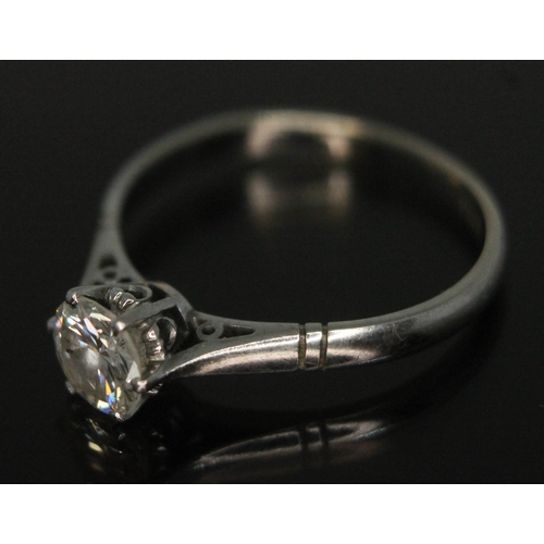 108 - A diamond solitaire ring, the stone weighing approx. 0.67 carats, band marked 'PLAT', gross wt. 3.12... 