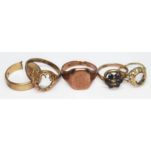 127 - A group of four hallmarked 9ct gold rings and another marked '9ct gold', gross wt. 15.43g.