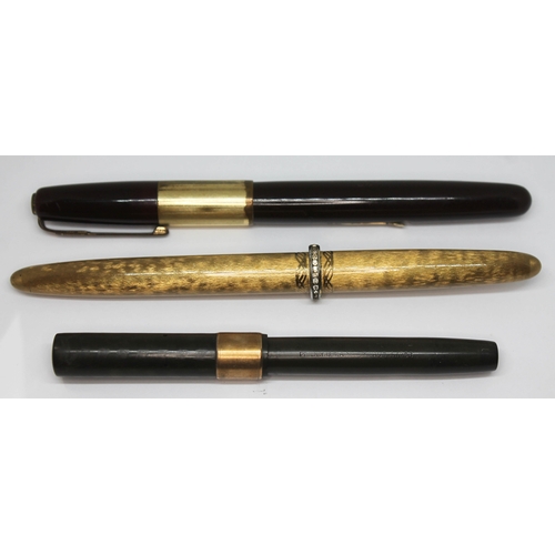 168 - A group of three vintage fountain pens comprising a Waterman's 877, a Sheaffer's Australia and a Wat... 