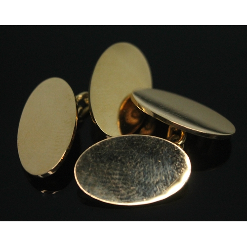 231 - A pair of hallmarked 18ct gold cufflinks, wt. 13.08g.