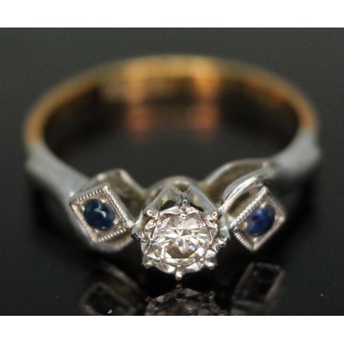 257 - A hallmarked 18ct gold and platinum diamond and sapphire ring, gross wt. 2.81g, size L.