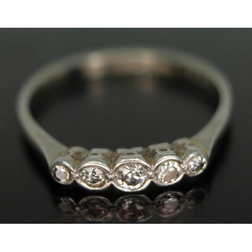 259 - A five stone diamond ring, band marked '18ct' & 'PLAT', gross wt. 1.81g, size N.