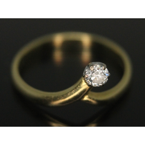 264 - An 18ct diamond solitaire ring, the modern round brilliant cut diamond weighing approx. 0.10 carats,... 