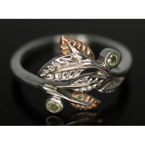 270 - A contemporary Arts & Crafts Welsh silver ring by Clogau, naturalistically formed as leaves with gol... 