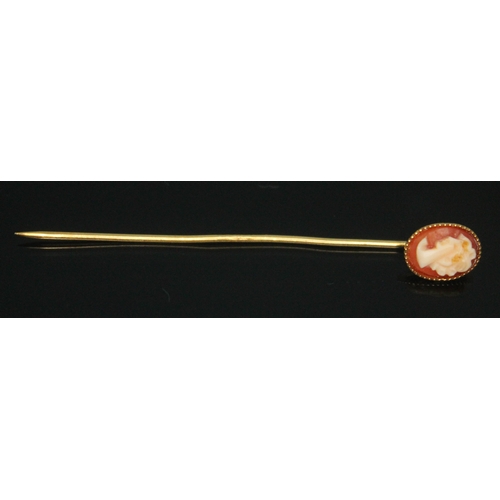 273 - A hallmarked 9ct gold cameo stick pin, length 54mm, gross wt. 0.73g.