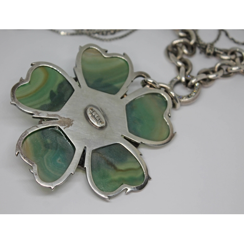 276 - A contemporary flower pendant with green dyed agate petals, yellow enamel and set with paste, suspen... 