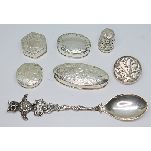 279 - A mixed lot comprising four pill boxes marked '925', a continental novelty souvenir spoon with owl f... 