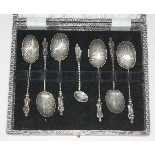 307 - A cased set of hallmarked silver apostle spoons with shell bowls.