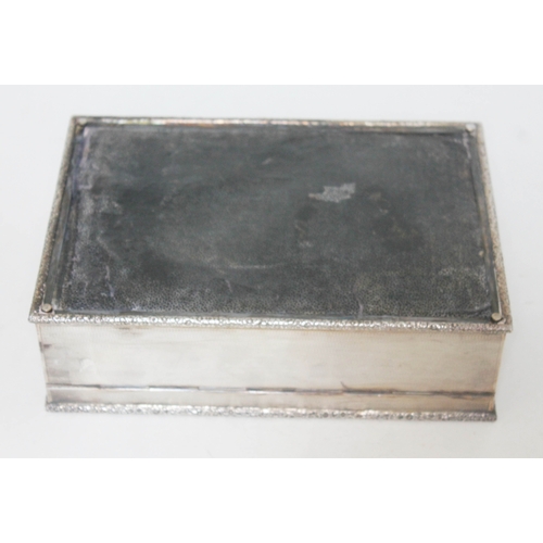 319 - A George VI silver cigar box, textured exterior with floral moulded border, gilt interior, cedar lin... 