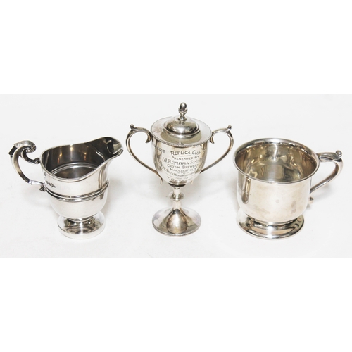 328 - Hallmarked silver comprising a trophy, a tankard and a jug, wt. 10oz.