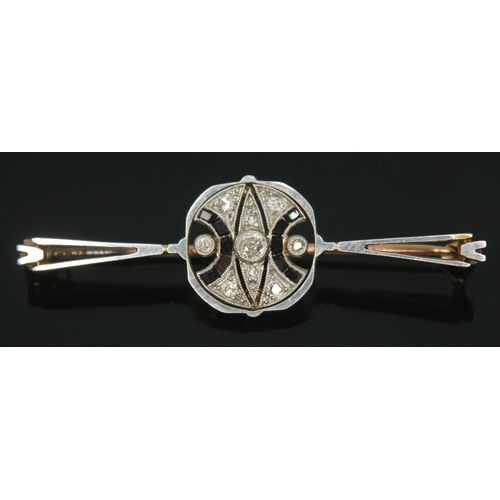 341 - An Art Deco diamond cluster bar brooch, length 47mm, unmarked, gross wt. 4.42g.