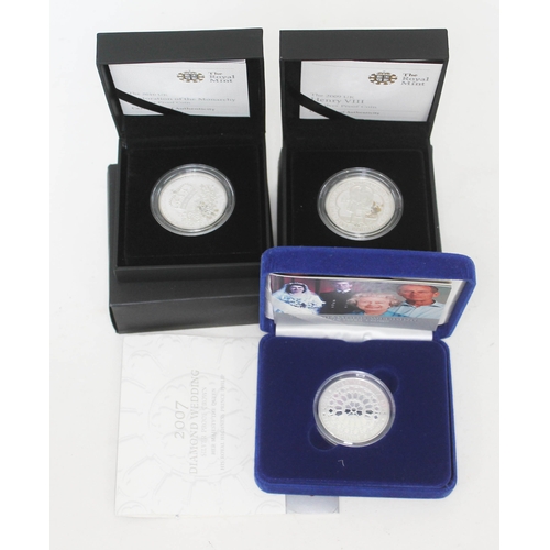 356 - A group of three Elizabeth II silver proof crowns comprising 2009 Henry VIII, 2010 Restoration of th... 