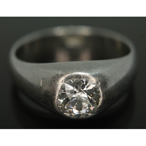 100 - A gent's diamond solitaire gypsy style ring, the rub over set old cut diamond weighing approx. 1.60 ... 