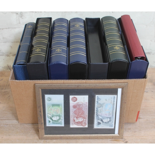 357 - Seven albums of world bank notes and three Bank of England notes framed.