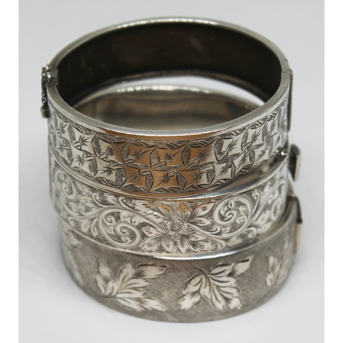 360 - A group of three hallmarked silver bangles.