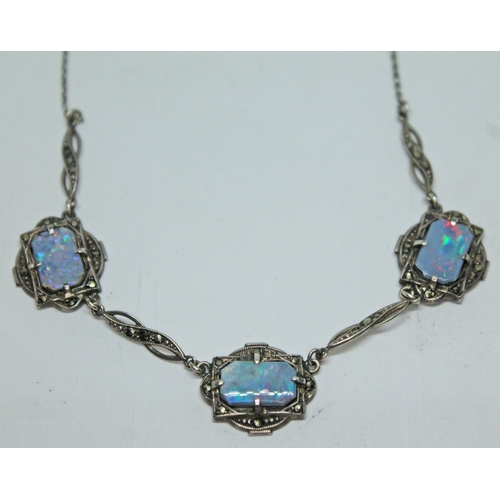 367 - A white metal necklace set with opal triplet panels and marcasites, length 41cm.