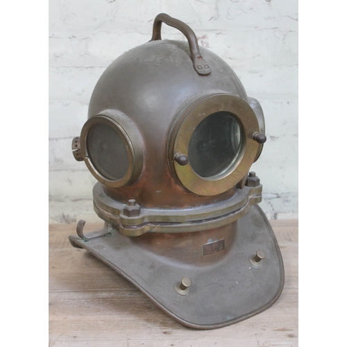 42 - A copper and brass deep sea diver's helmet, height 48cm.