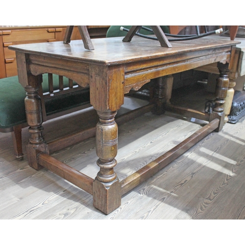 68 - An oak refectory table and five chairs.