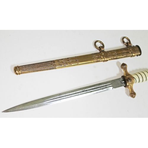 393 - A German WWII Third Reich Kriegsmarine dagger, wire bound plastic grip with gilt brass swastika and ... 